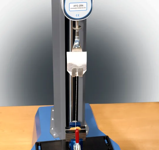 Tea-bag integrity test with custom fixture and a digital force gauge