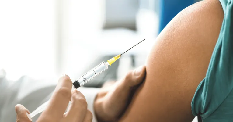 person being injected - syringe