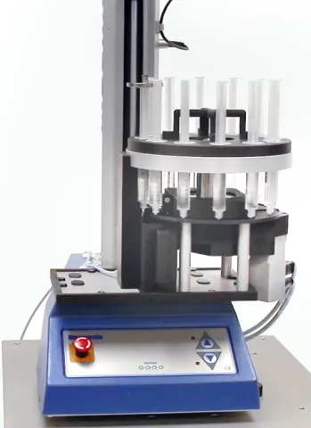 Automated syringe tester in use testing 12 specimens