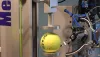 Tennis ball compression