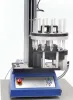 Automated syringe tester in use testing 12 specimens